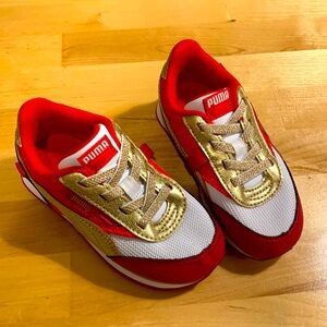 Toddler girls red/pink/gold slip on Pumas. Size 9c, nearly new